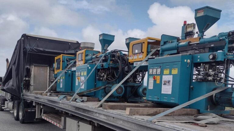 Injection molding machines Conestoga flatbed trailer transport