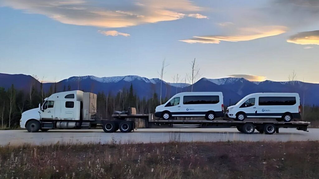 Sprinter van secured for large vehicle transport to Alaska by Abound Transport.