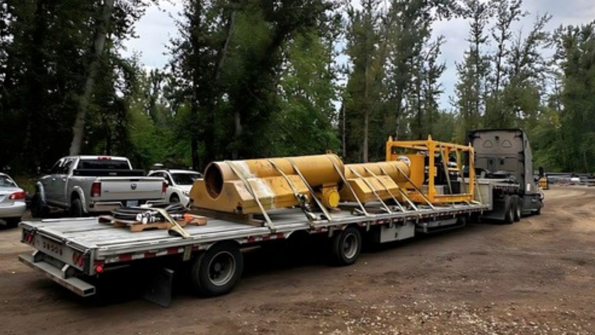 Flatbed trailer hauling industrial equipment near Medford, Oregon