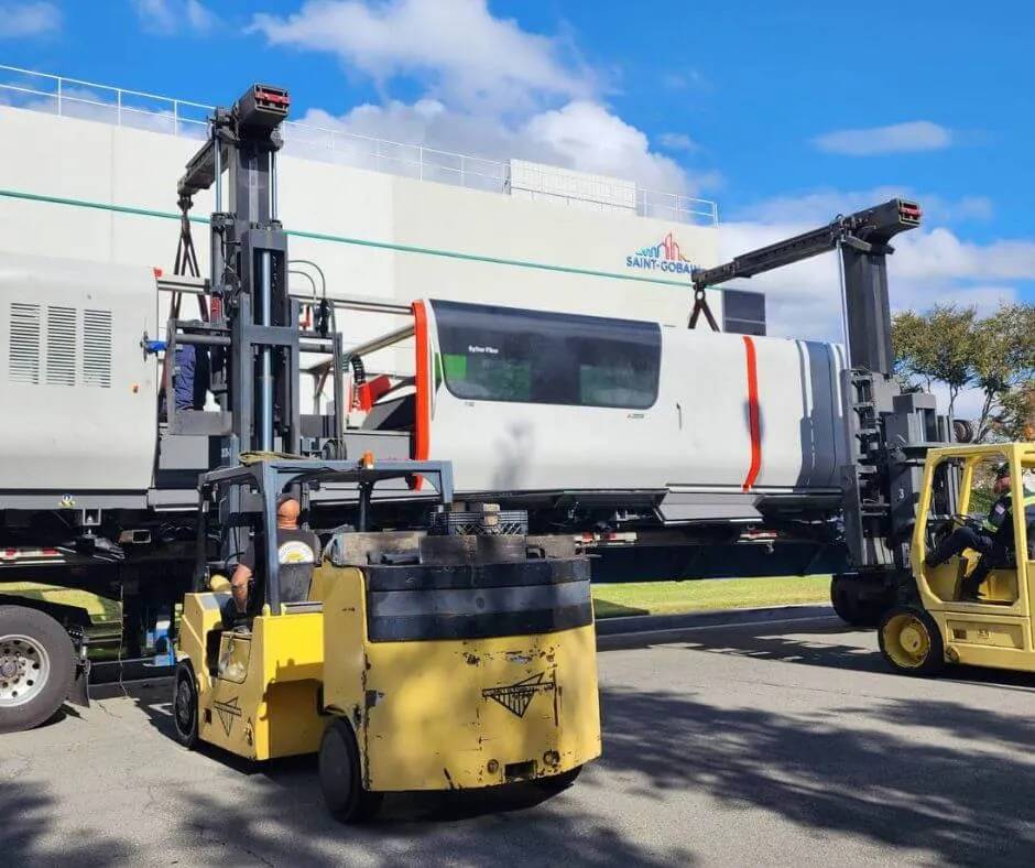 Laser machine loaded on flatbed trailer for Colorado heavy haul