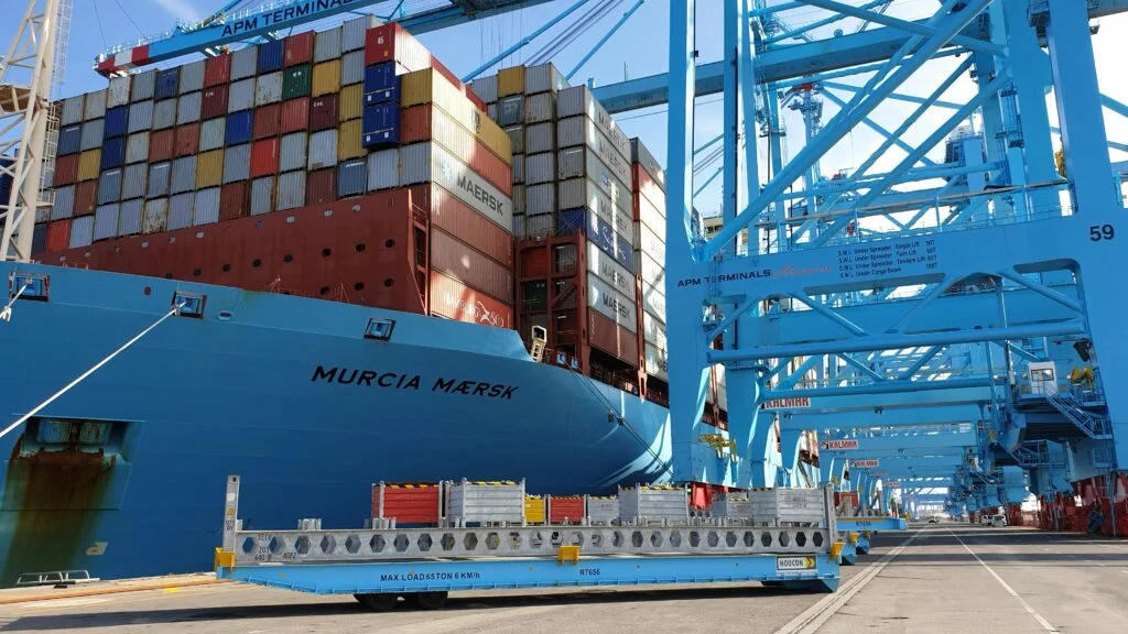 Murcia Maersk container ship docked at APM Terminals with large blue gantry cranes and cargo platform