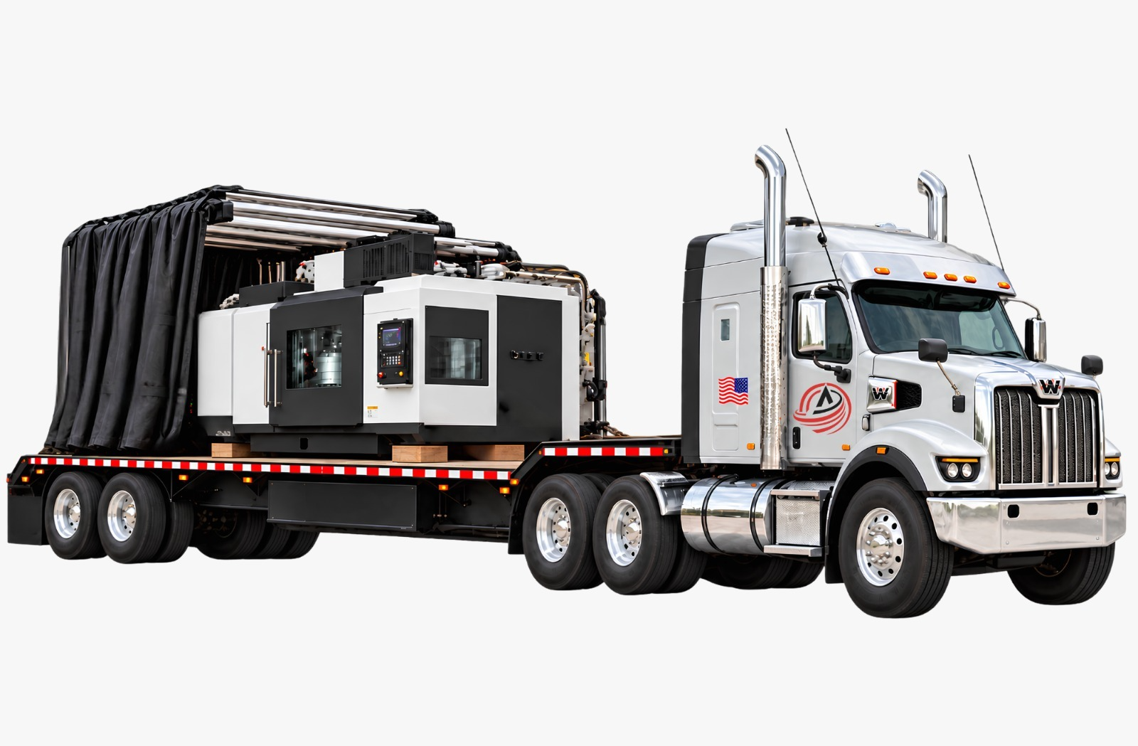 Abound Transport heavy haul semi-truck transporting specialized CNC milling and metalworking machinery on a flatbed trailer